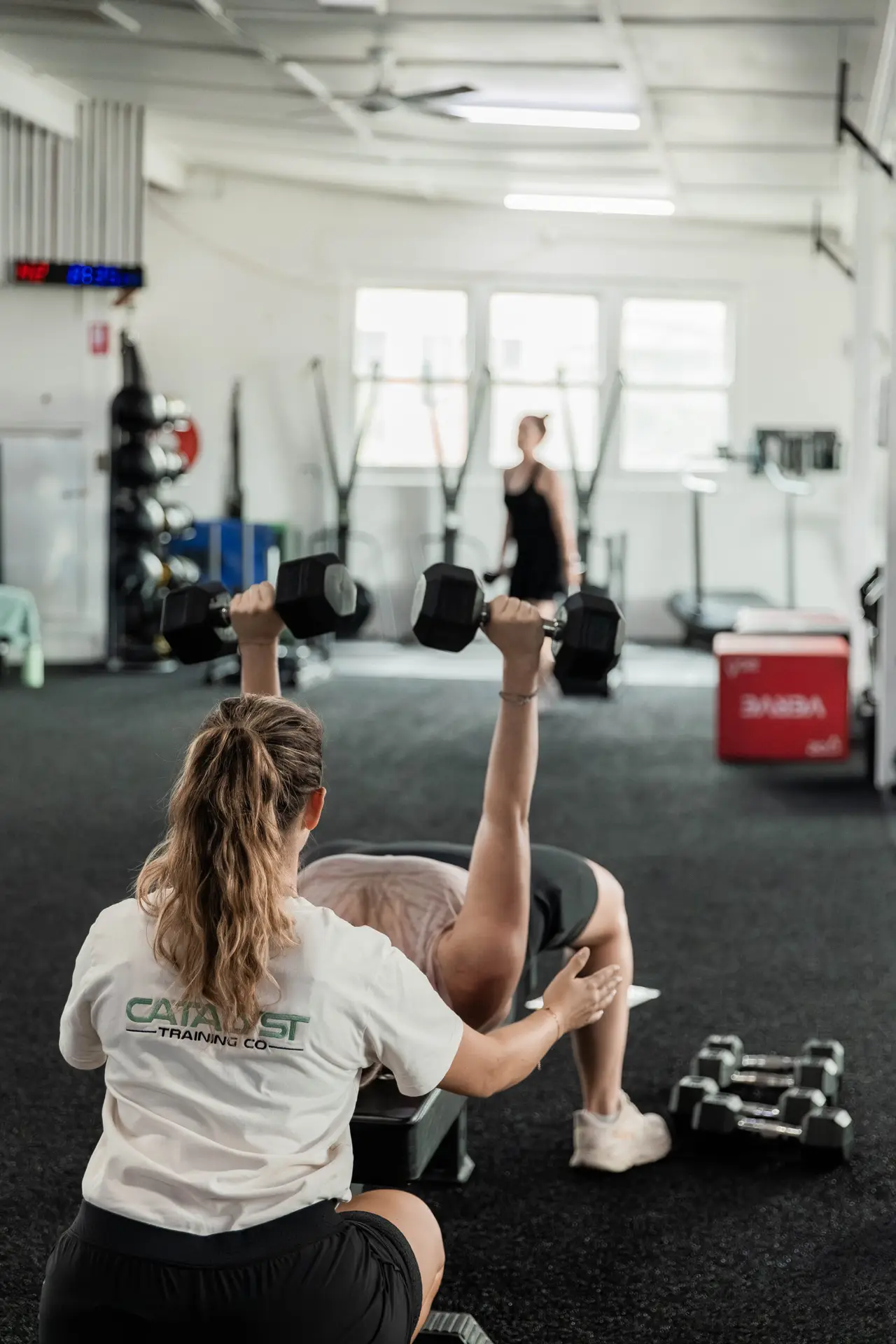 A Catalyst coach running a personal training session at the Randwick studio