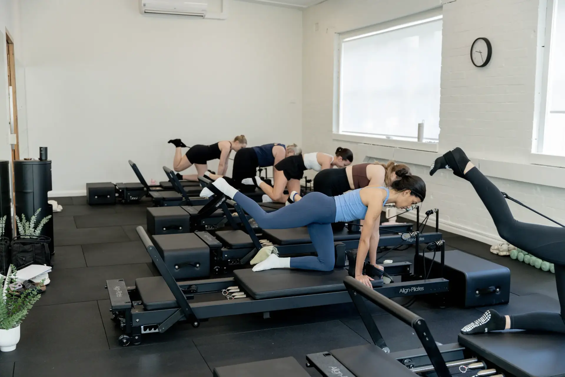 A small group reformer Pilates class at Catalyst Training Co Randwick